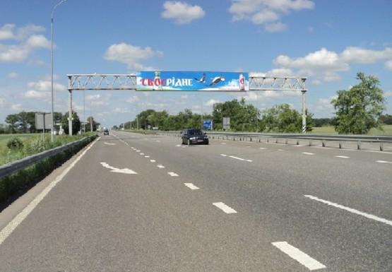 Фото рекламной плоскости по адресу Трасса M-03, Киев - Харьков, 54,500