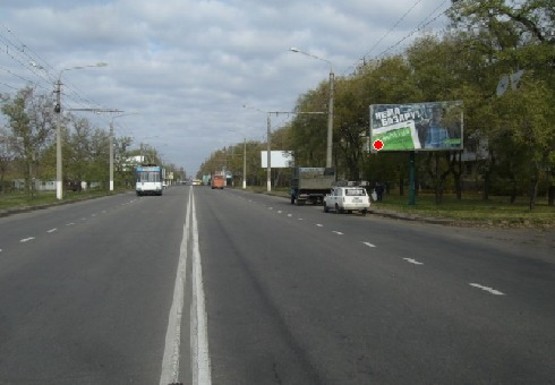 Фото рекламної площини за адресою Героев Сталинграда пр., 67  -  за Школьной ул.