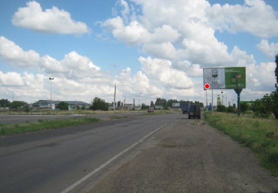 Фото рекламної площини за адресою Киевская трасса - въезд  4