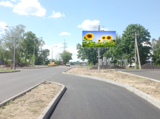 Фото рекламної площини за адресою ул. Депутатская, выезд на трассу, напротив Варшавского рынка