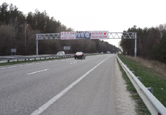 Фото рекламной плоскости по адресу Трасса M-06, Киев-Житомир, 55,700