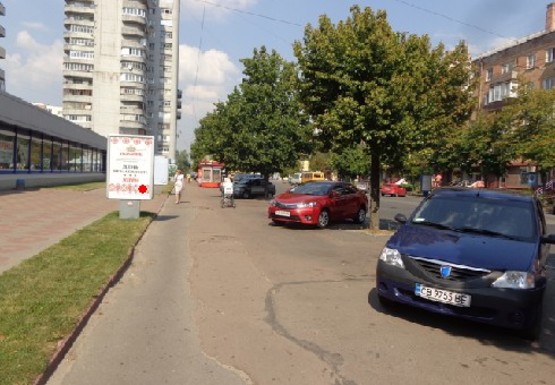 Фото рекламной плоскости по адресу Победы пр., магазин Прогресс, 4