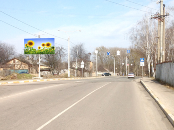 Фото рекламної площини за адресою ул. Вокзальная, перед переездом