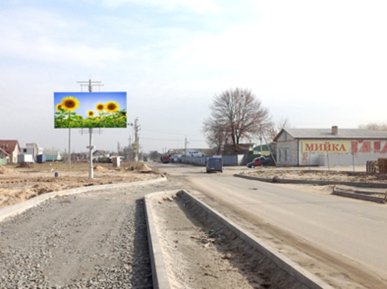 Фото рекламної площини за адресою ул. Депутатская, въезд с трассы, напротив Варшавского рынка