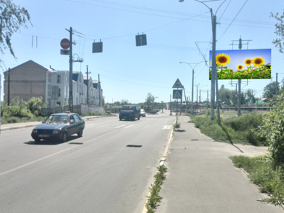 Фото рекламної площини за адресою ул. Вокзальная, возле переезда