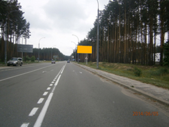 Фото рекламной плоскости по адресу ул. Университетская, перед кладбищем (по Ирпенской трассе направление из Киева)