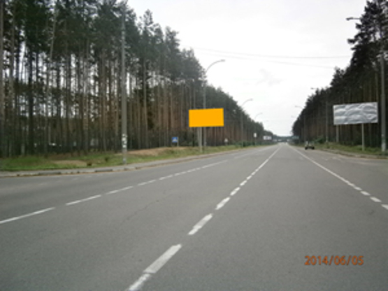 Фото рекламной плоскости по адресу ул. Университетская, за кладбищем (по Ирпенской трассе направление на Киев)