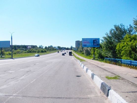 Фото рекламной плоскости по адресу 20 лет Победы в центр  за  мостом  на ул. Герасима Кондратьева, (600 м от  АЗС "ANP" и АЗС"Аміс" )