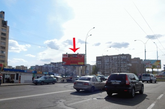 Фото рекламной плоскости по адресу Героев Днепра ул., напротив рынка, от ст.м."Героев Днепра"