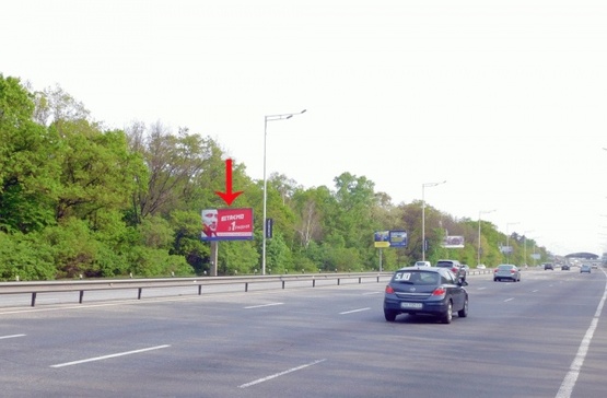 Фото рекламной плоскости по адресу Столичное шоссе, урочище Бычек, 540 м от ж/д моста, из центра