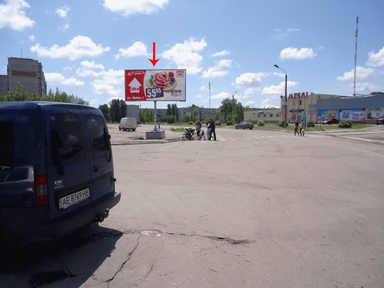 Фото рекламной плоскости по адресу Гагарина ул., район рынка Новый, из центра