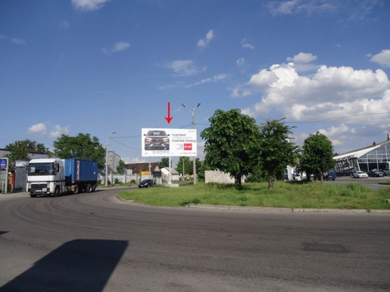 Фото рекламной плоскости по адресу Ивана Эзау ул. 10А, возле Автоцентра Аэлита, из центра