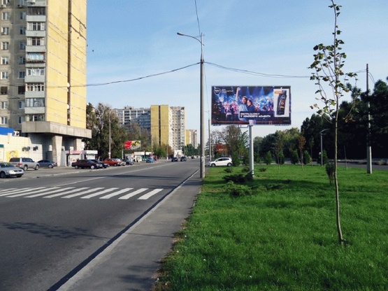 Фото рекламної площини за адресою Малиновского ул. 34, напротив "АТБ"