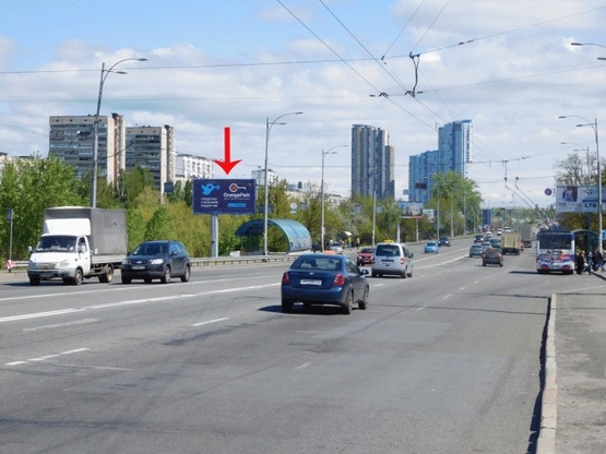 Фото рекламной плоскости по адресу Воссоединения пр-т, 1-й  от моста Патона, ж/м Русановка, из центра