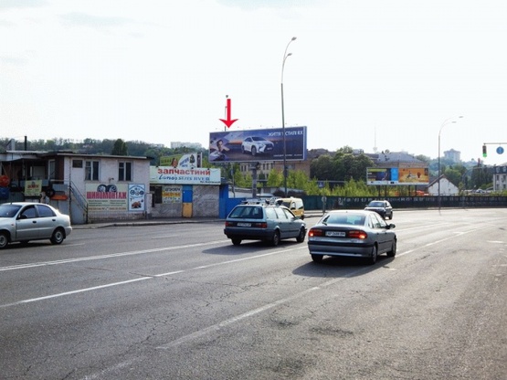 Фото рекламної площини за адресою Набережно-Луговая ул., возле ул.Межигорская, у СТО, из центра, левая