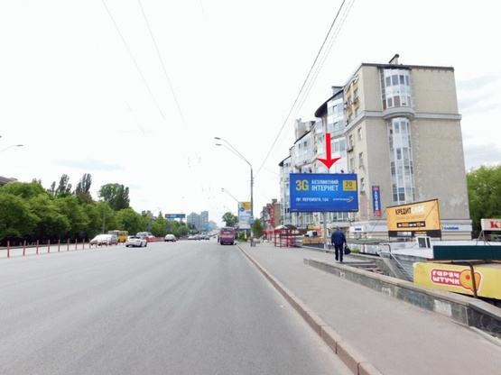 Фото рекламной плоскости по адресу Победы пр-т 94/1, возле супермаркета Фуршет,из центра