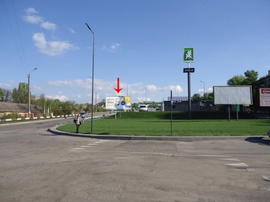 Фото рекламной плоскости по адресу Аношкина пр-т, пересечение с ул.Сыровца, съезд с левобережного моста, возле кафе Сафран, в центр