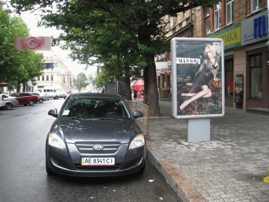 Фото рекламної площини за адресою Короленко ул.1, возле "ГрандПлаза", Центрального Дома Быта