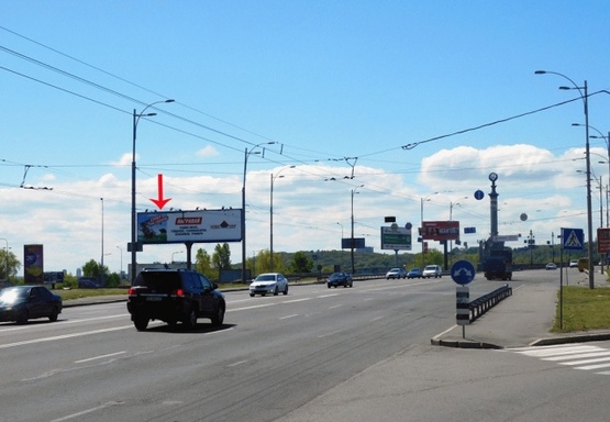 Фото рекламной плоскости по адресу Воссоединения пр-т съезд с моста Патона на ул. Сераф, левый
