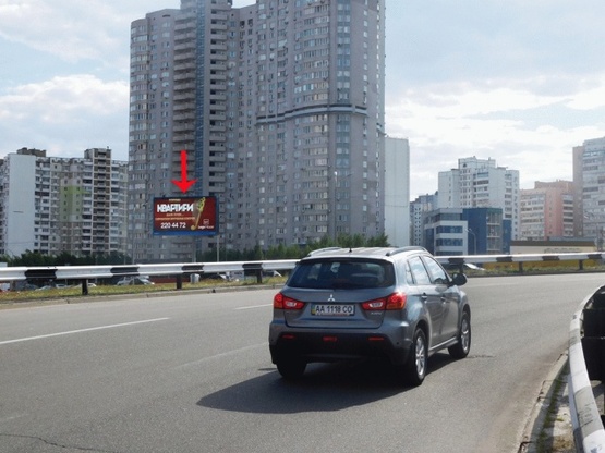 Фото рекламной плоскости по адресу Григоренка Петра пр-т, напротив ТЦ Пирамида, от ул.Бажана М., из центра