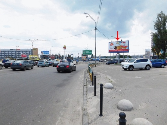 Фото рекламной плоскости по адресу Московський пр-т 23, возле ст.м.Петровка, на територии автостоянки