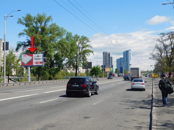 Фото рекламной плоскости по адресу Воссоединения пр-т, 3-й  от моста Патона, ж/м Русановка, из центра