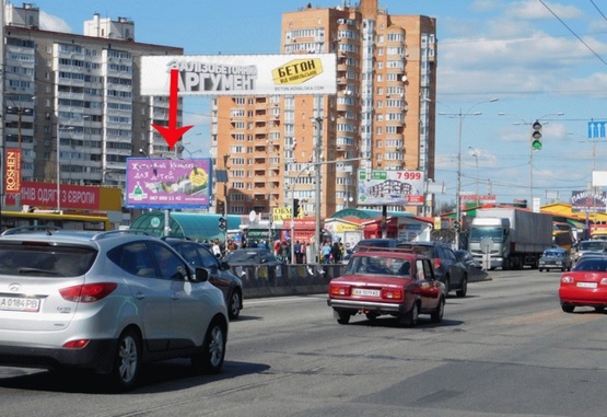 Фото рекламной плоскости по адресу Палладина Академика пр-т перекр.ул. Уборевича от пр.Победы, на раздел. треугольнике