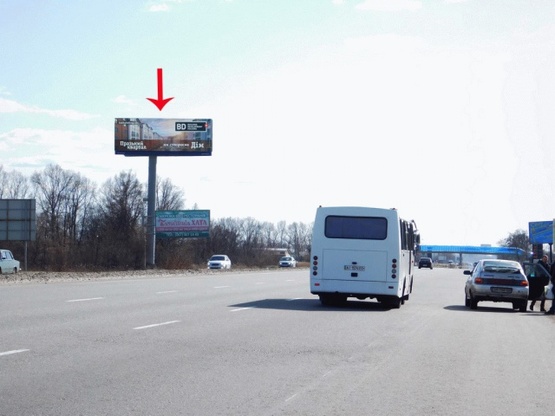 Фото рекламной плоскости по адресу Выезд из Киева, в сторону Одессы, к н.п.Глеваха, к котедж.городку Садок Вышневый