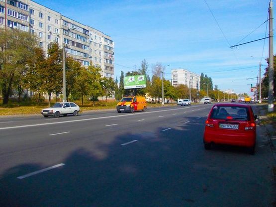 Фото рекламної площини за адресою Прокофьева ул., 30 (Аллея Олимпийской славы, Олимпийский комплекс,200 м. к супермаркету "Амбар")