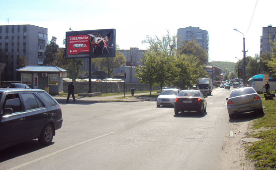 Фото рекламной плоскости по адресу Обухов Каштановая/ Киевская 18 (В)/ощад банк, податкова