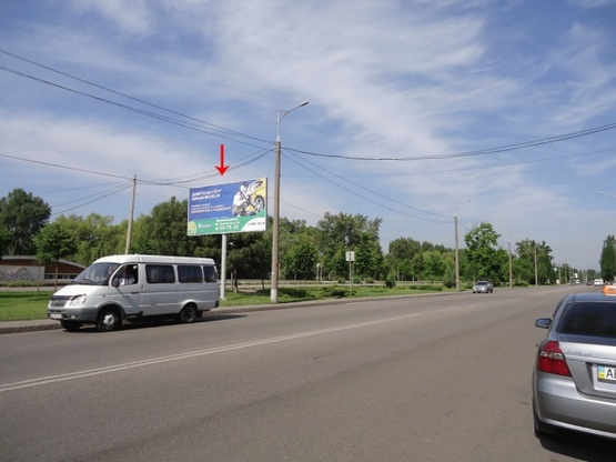 Фото рекламної площини за адресою Малиновского ул. 34, напротив "АТБ"