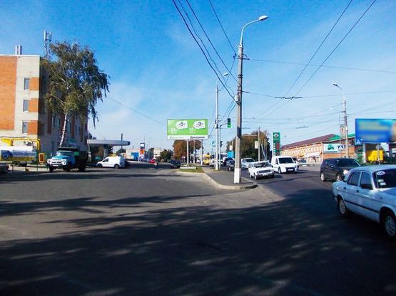 Фото рекламной плоскости по адресу Белопольский путь ул., 16 - 8-го Марта ул. (перед АЗС "Авіас",напротив АЗС "Маршал")