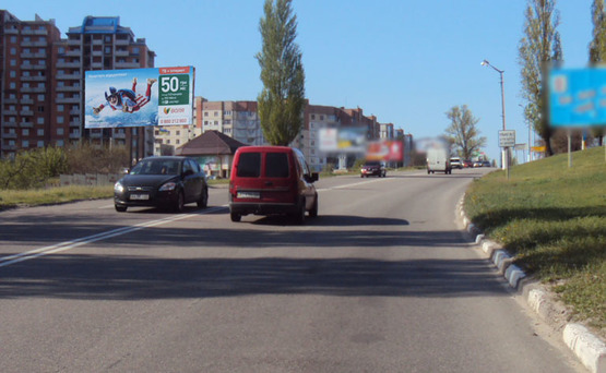 Фото рекламной плоскости по адресу Обухов ул.Киевская 10 (В)/рынок "Песчаный" въезд