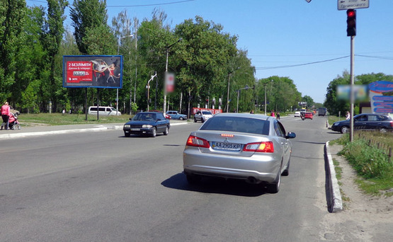 Фото рекламной плоскости по адресу Бровары ул.Грушевского,5 / Кирова  (В) из Киева/АТБ