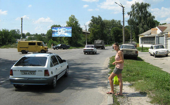 Фото рекламной плоскости по адресу Обухов ул.Киевская 56/ул.8 Марта (В)