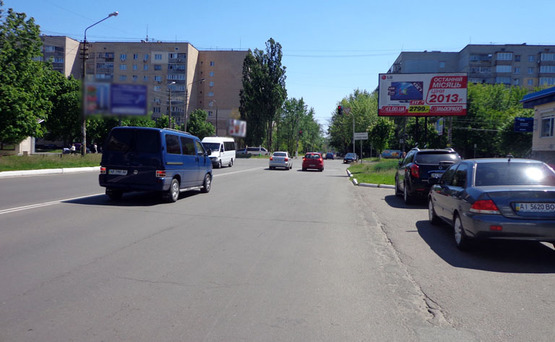 Фото рекламной плоскости по адресу Бровары бул.Незалежности,13/ул.Короленко (А)/ВТБ банк,Космо