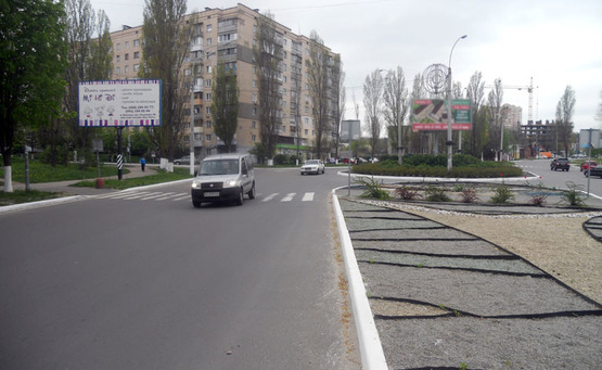 Фото рекламної площини за адресою Вышгород ул.Шолуденко,7/Мазепи/клумба (напр.на трассу Киев-Иванков) (В)