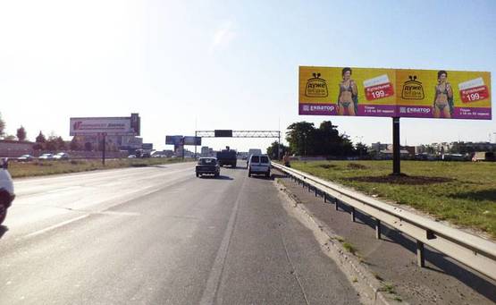 Фото рекламной плоскости по адресу Окружная 12 /Лерой Мерлин,супермаркет Новус (А) правый (напр.к пр-ту Победы)