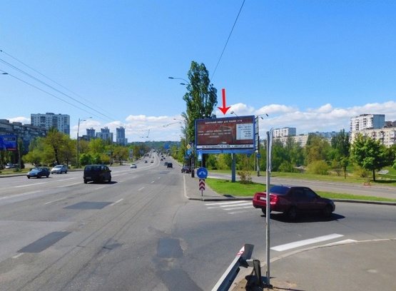 Фото рекламной плоскости по адресу Воссоединения пр-т, развязка в сторону ст.м."Левобережная", в центр