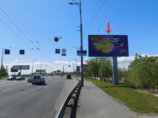 Фото рекламной плоскости по адресу Воссоединения пр-т, 1-й  от моста Патона, ж/м Русановка, в центр