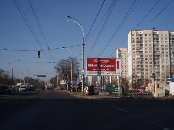 Фото рекламної площини за адресою Правды проспект, 66 универсам "Виноградарь"