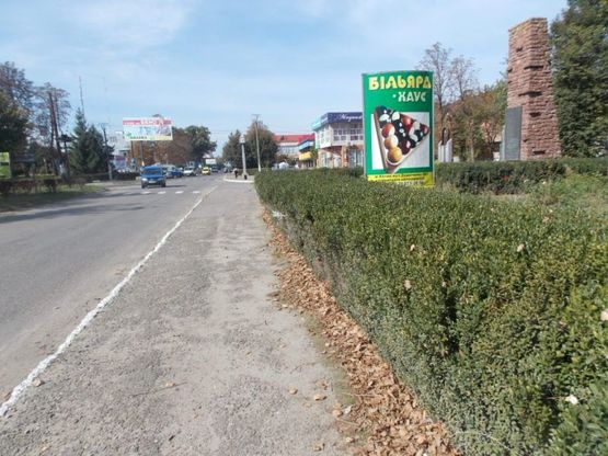 Фото рекламной плоскости по адресу Улица Олимпийская(между улицами Шевченко и Свято-Покровская), напротив бизнес центра "КАПИТАЛ"