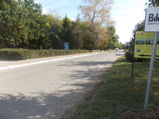 Фото рекламной плоскости по адресу Улица Олимпийская(между улицами Шевченко и Свято-Покровская), напротив бизнес центра "КАПИТАЛ"