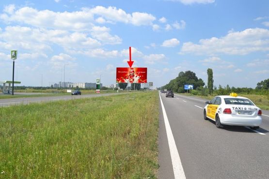 Фото рекламної площини за адресою Московский пр-т - Ростовская трасса  возле АЗС ОККО 2(въезд в город)