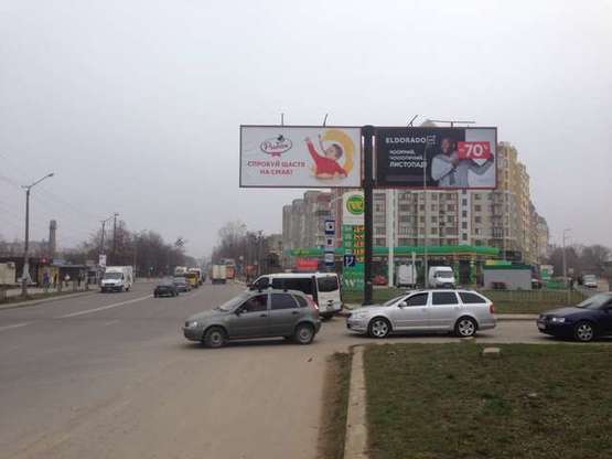 Фото рекламной плоскости по адресу Довженка вул. - Сухомлинського вул. (в центр, права)