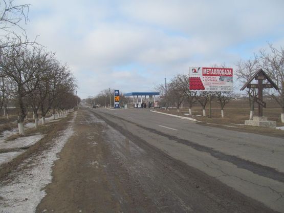 Фото рекламной плоскости по адресу Беляевка ул.Ленина