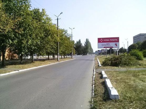 Фото рекламної площини за адресою Неделина ул.- Победы пр., 34, мкр. Ингулец