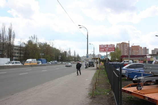 Фото рекламної площини за адресою Палладина, крупная транспортная развязка, на территории рынка "Троицкий", в направлении м. Академгородок ТЦ "Novus"