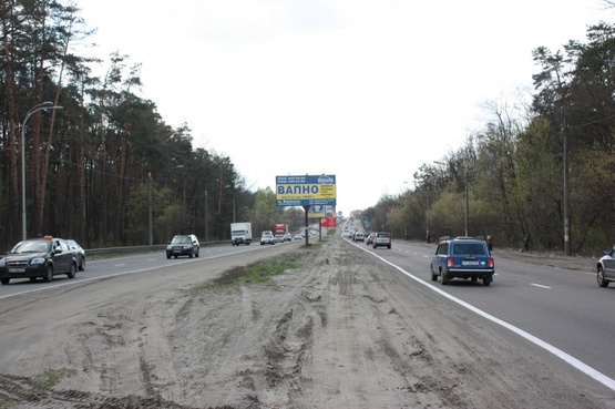 Фото рекламной плоскости по адресу Палладина, крупная транспортная развязка, на разделителе в направлении  м. Академгородок ТЦ "Агромат" "Novus" "Эпицентр"