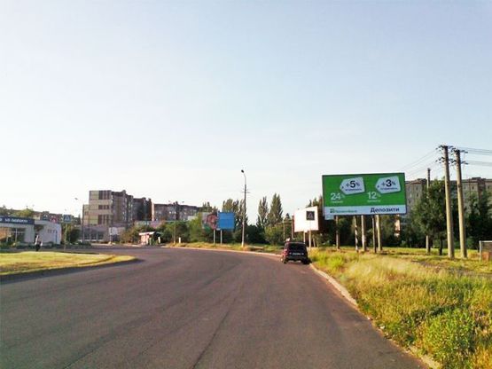 Фото рекламной плоскости по адресу Глазового ул., 8 - Вечерний бул. ( ст. СТ "пл. Поля"), дв-е к Быкова ул.